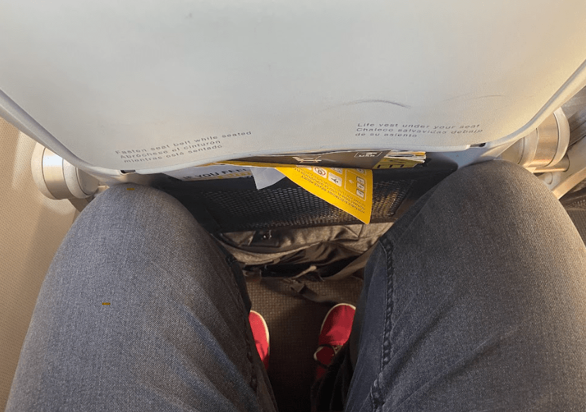 Image showing legroom on board, their is a small amount if space between the knees and the seat in front.