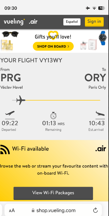 Image showing Vueling inflight tracker, including departure and arrival airports, times and time remaining in flight.
