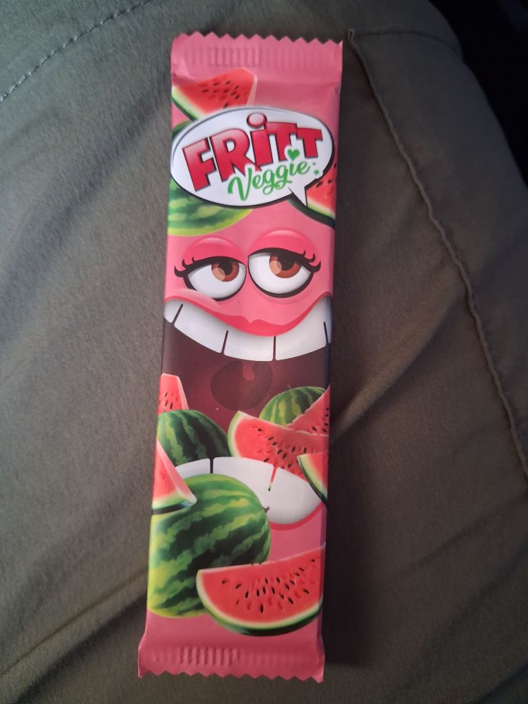 Sweet packet with eyes and lips eating watermelon